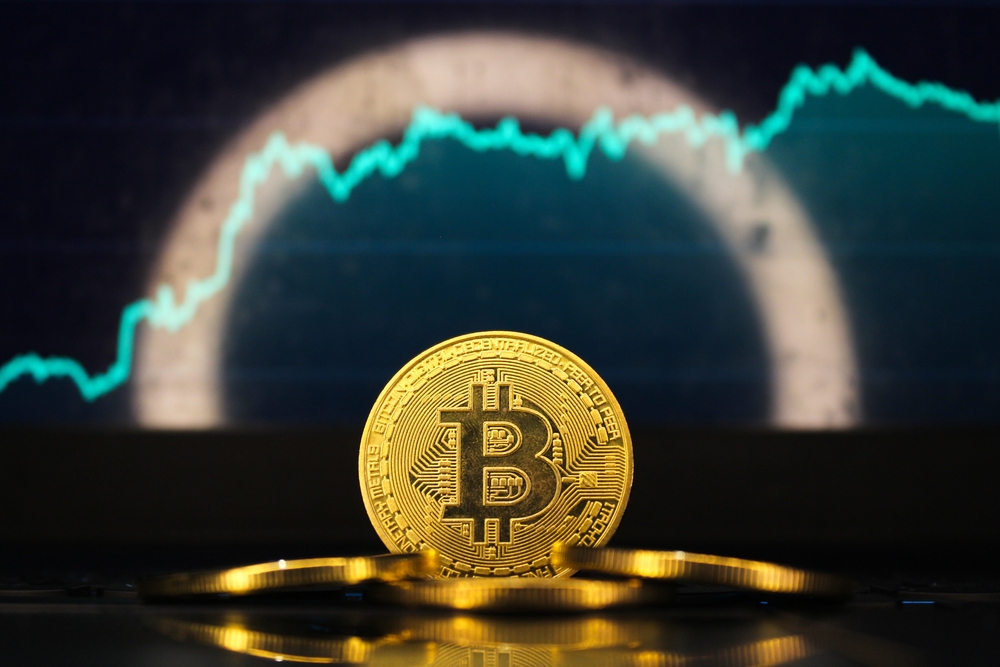 bitcoinstandsinfrontofagreenrisingpricechart